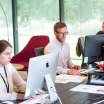 People working at desks together